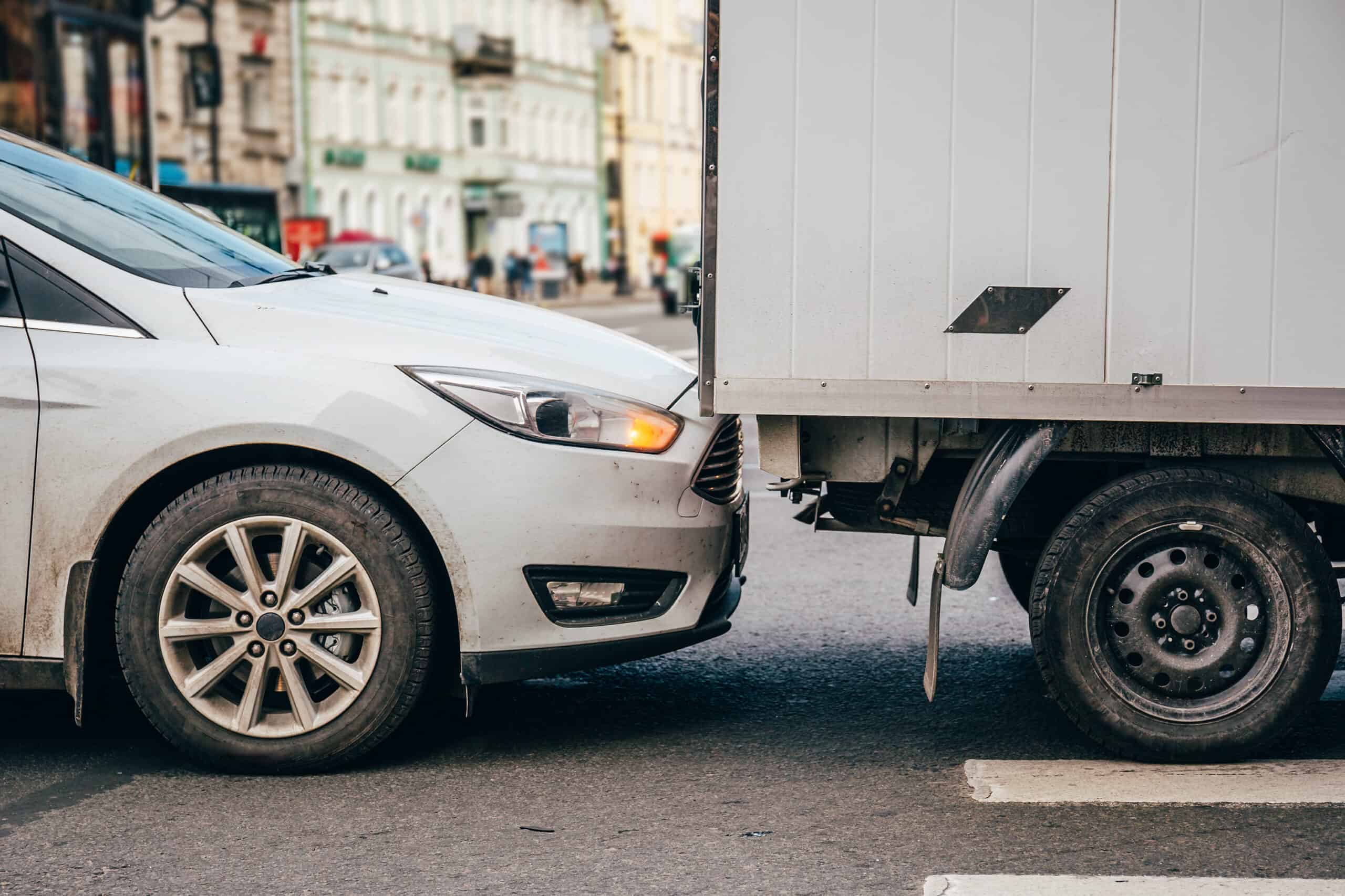 car bumping a truck on a motor vehicle accident